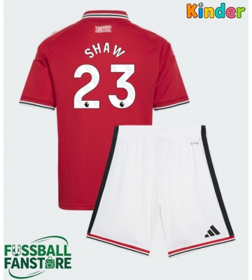 Manchester United Luke Shaw #23 Replik Heimtrikot Kinder 2026-27 Kurzarm (+ Kurze Hosen)